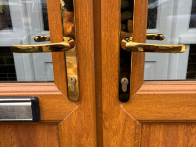 Pair of brass lever lever upvc door handleset in Portsmouth - After