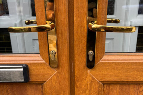 Pair of brass lever lever uPVC door handleset Havant