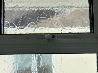 Versa white locking cockspur window handle fitted near West Sussex