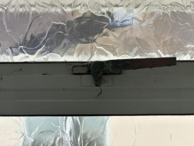 Versa white locking cockspur window handle fitted in Goring by sea - before