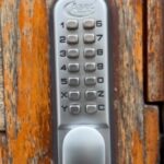 Change code on communal keypad lock in [city]