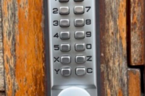 Change code on communal keypad lock in Findon